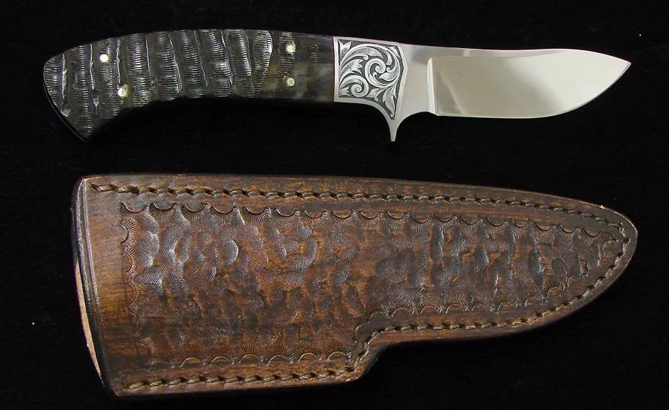 Bill Cheatham Semi-Skinner. A very regal looking knife from Bill Cheatham, this 3 1/2″ blade made of ATS-34 steel is mirror poli (K976)