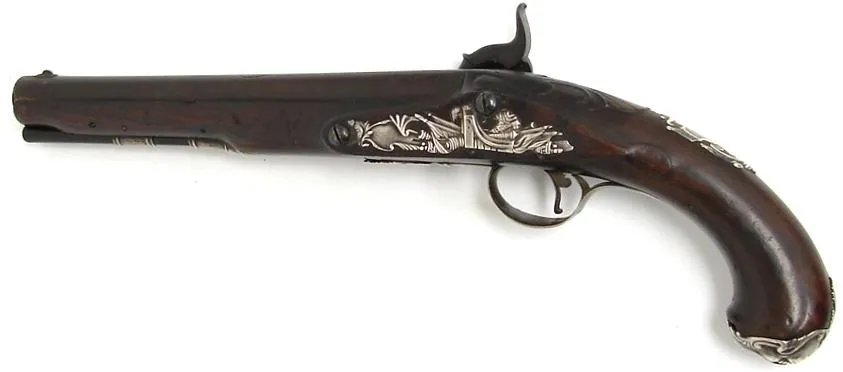 British Georgian pistol by Page of Bristol. Silver mounted with grotesque mask butt and panoply of arms sideplate. Converted to (ah1864)
