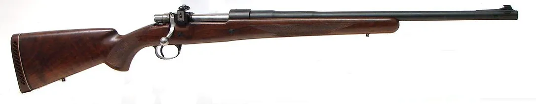 Browning Safari .458 WIN Magnum caliber rifle. Customized Belgian made rifle. The barrel has been cut down to 21″ and Mag-Na-Por (R14850)