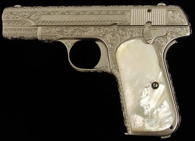 Colt 1908 .380 ACP caliber pistol. Custom engraved pre-war pocket auto. Has full coverage fancy scroll, nickel finish and genuin (c5310)