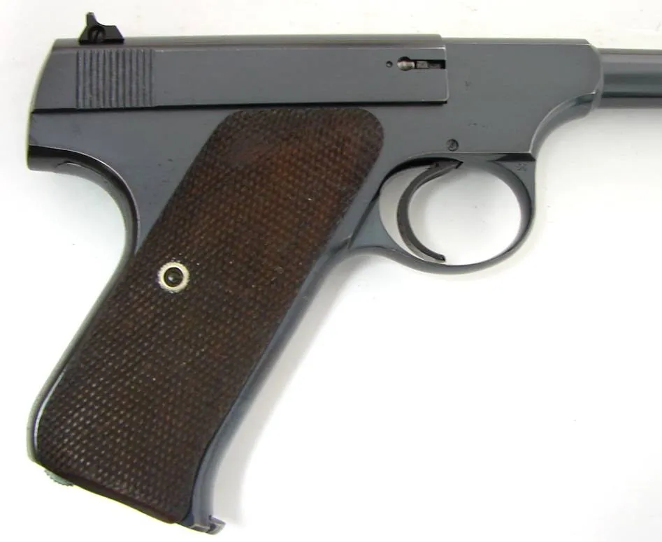 Colt Woodsman .22 LR caliber pistol. Manufactured approximately 1938. Excellent bore. Gun has 98% blue. Grips are excellent. Gun (C7362)