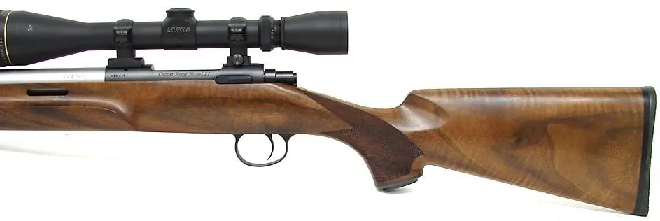 Cooper Arms Model 21 .223 Rem caliber rifle. Montana Varminter model with checkered bolt handle. Excellent condition with Leupol (r3995)