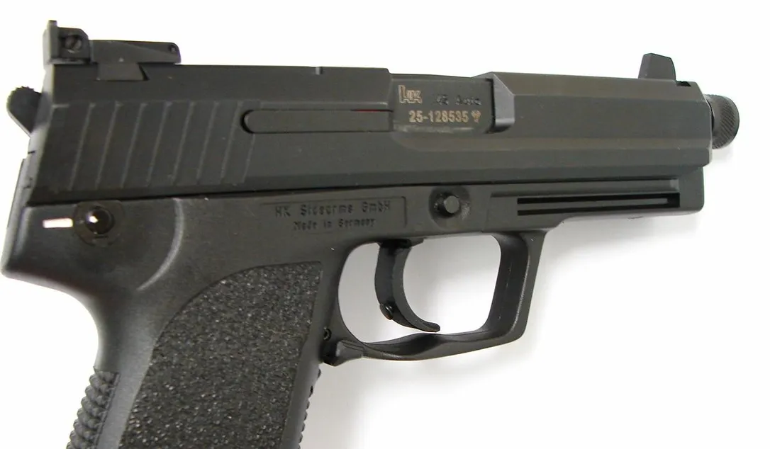 Heckler & Koch USP Tactical .45 ACP caliber pistol. Popular tactical model with threaded barrel and adjustable sights. Excellent (PR23956)