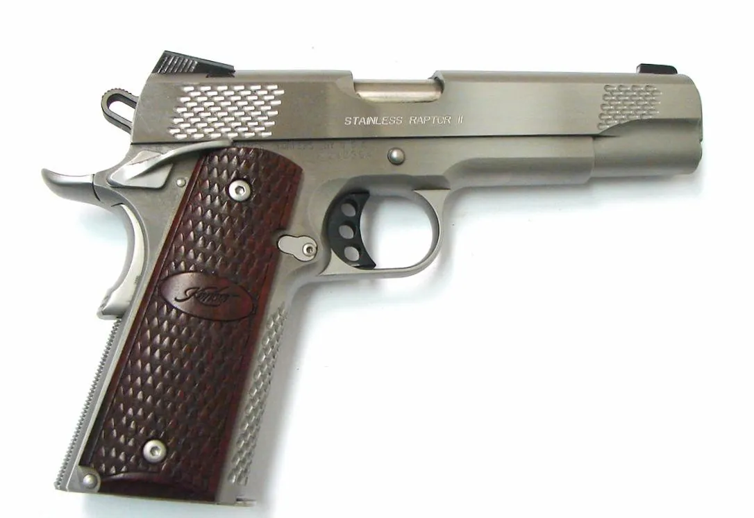 Kimber Stainless Raptor II .45 ACP caliber pistol. Full size stainless steel model with special serrations and includes box. Exc (PR20203)