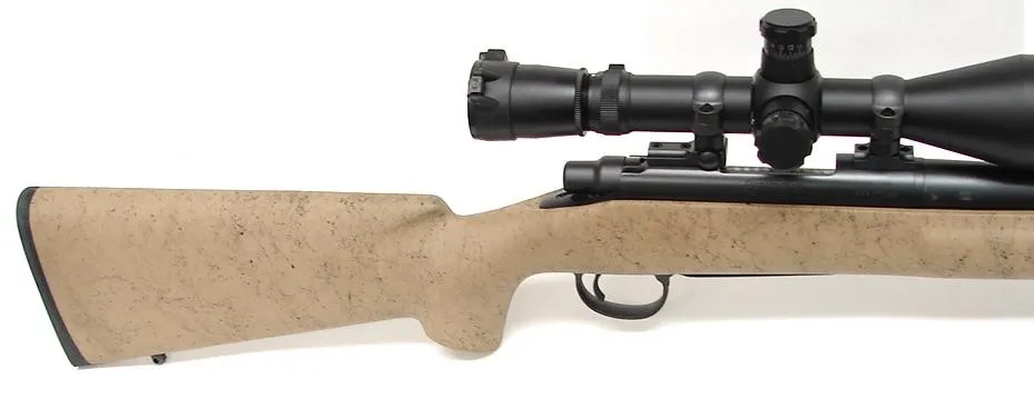 Remington 700 BDL LH .22-250 Rem caliber rifle. Left hand varmint model with fluted barrel and synthetic stock. Excellent condit (r5081)