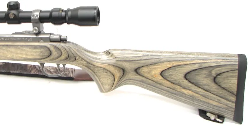 Ruger 77/17 .17 caliber rifle. Stainless steel heavy barrel varmint model with laminated stock and Tasco 4×16 scope. In excellen (r9141)