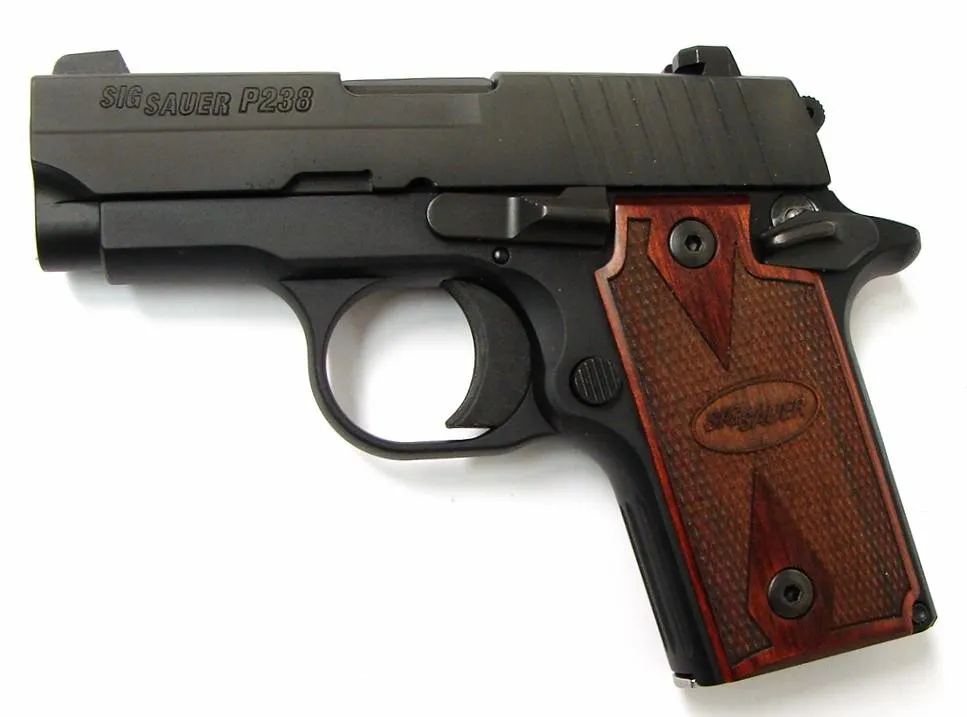 Sig Sauer P238 .380 ACP caliber pistol. Sig Sauer P238 model with night sights, box, safety, holster, wood grips and one magazin (PR21594)