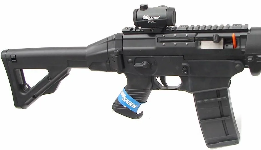 Sigarms 556 .223 Rem caliber rifle. Classic model with Swiss 550 style folding stock and red dot sight. New. On sale from (r8817)